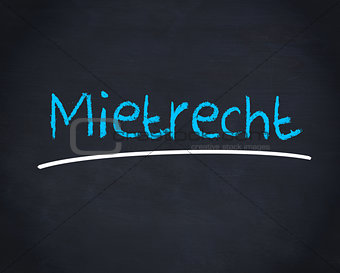Mietrecht word written in blue on a blackboard