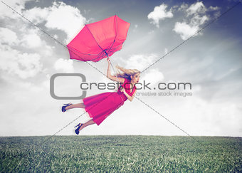Attractive woman flying in the air