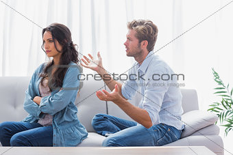Woman sulking while her partner is talking to her