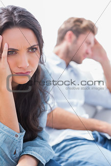 Worried woman holding her head