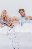 Cheerful family playing video games