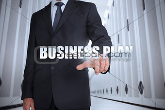 Businessman selecting the term business plan