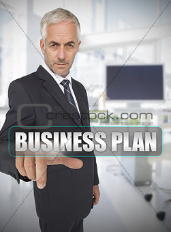 Businessman touching the term business plan