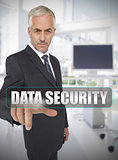 Businessman touching the term data security