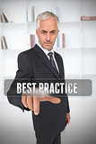 Serious businessman touching the term best practice