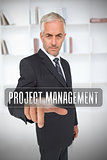 Serious businessman touching the term project management