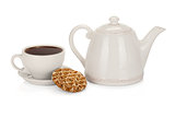 Cup of tea with teapot and a coockie on white
