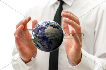 Male hands holding the  earth globe. "Elements of this image fur