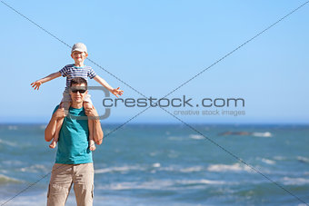 family together at the beach