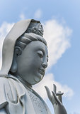 Buddha against blue sky