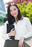 Smiling Young Asian Woman or Businesswoman