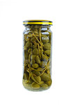 Glass jar with marinated capers fruits