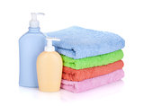 Cosmetics bottles and towels