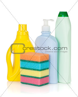 Plastic bottles of cleaning products and sponges