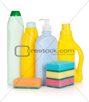 Plastic bottles of cleaning products and sponges