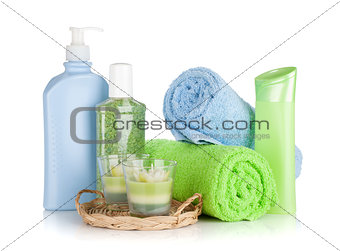 Bathroom bottles, towels and candles