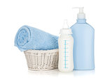 Baby milk bottle, shampoo and towel