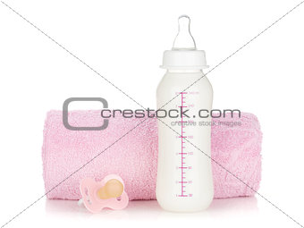 Baby bottle, pacifier and towel
