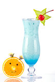 Blue tropical cocktail with coconut cream and orange face
