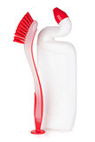 Plastic bottle of cleaning product and brush