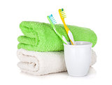 Toothbrushes and two towels