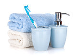 Toothbrush, soap and two towels