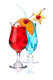 Two tropical cocktails: red and blue