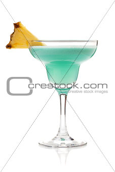 Blue tropical cocktail in margarita glass