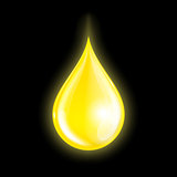 Drop of oil isolated on dark background.