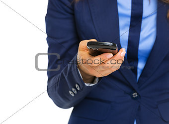 Closeup on business woman writing sms