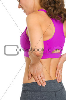 Closeup on woman with back pain