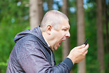 Angry man screaming in phone