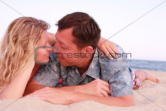 couple in love on the shore of the sea