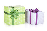 Two colorful gift boxes with ribbon and bow