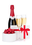 Champagne bottle, glasses and gift