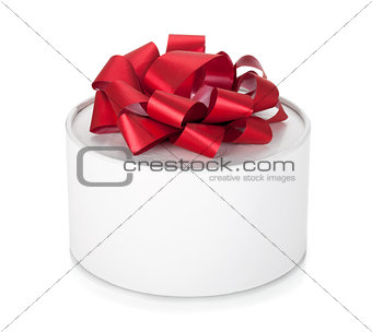 Single round gift box with red ribbon bow