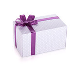 Blue gift box with violet ribbon and bow