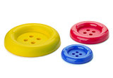 Three colored sewing buttons