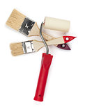 Two paintbrushes and roller