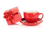 Red coffee cup and gift box with bow