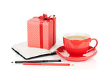 Coffee cup, red gift box and office supplies