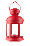 Red metal lamp with candle