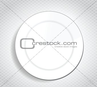 blank white dinner plate over a cloth