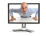 Angry boss screaming through the computer monitor