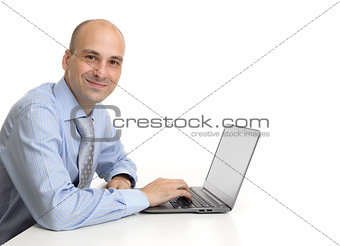 Portrait of young business man with laptop