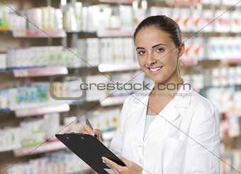 Portrait of Smiling Woman Pharmacist whit clipboard