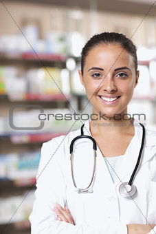 Portrait of Smiling Woman Pharmacist in Pharmacy