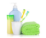 Toothbrushes, cosmetics bottles and towel