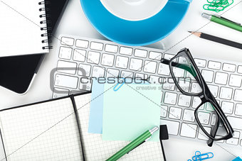 Office supplies, glasses and computed keyboard