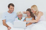 Family using a laptop